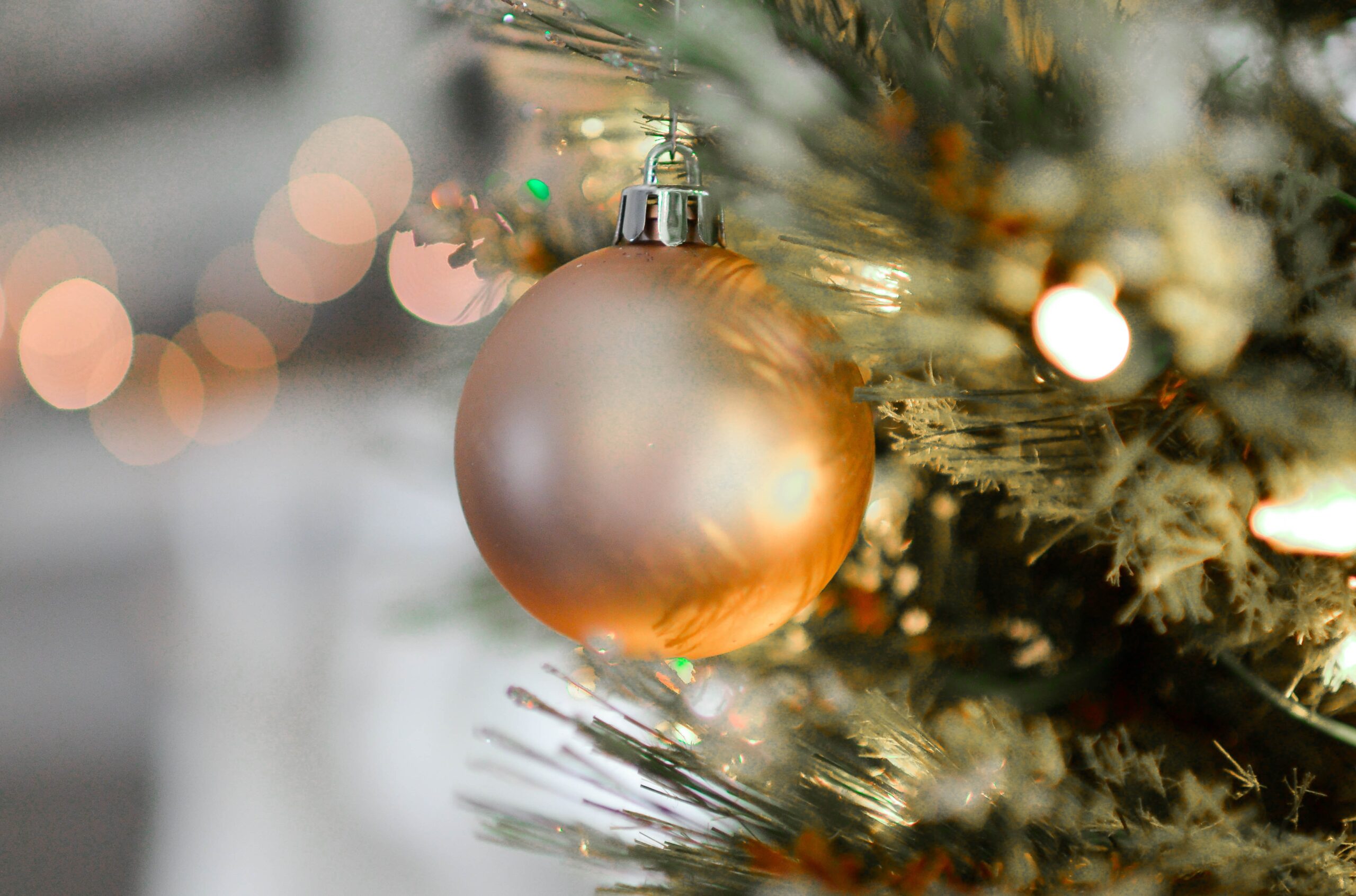 Christmas tree with gold globe ornament