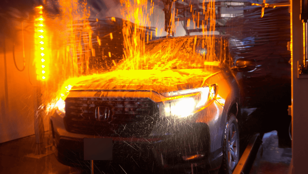 an SUV going through a car wash tunnel