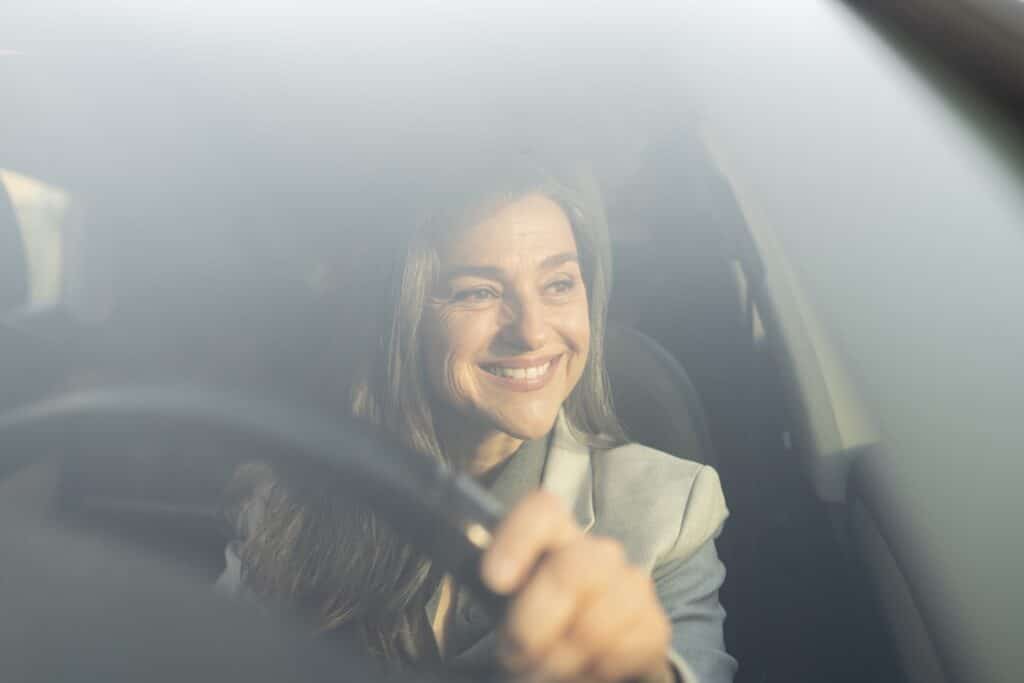 Woman drivnig a car